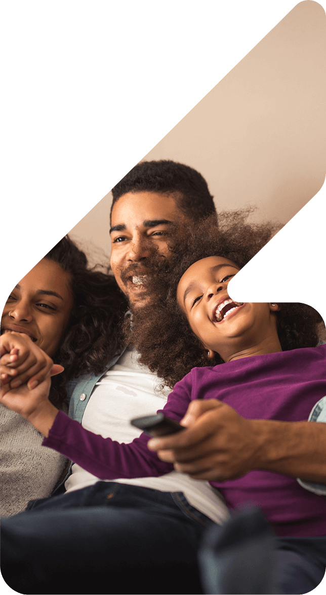 Image showing a family of 3 cuddling and laughing together
