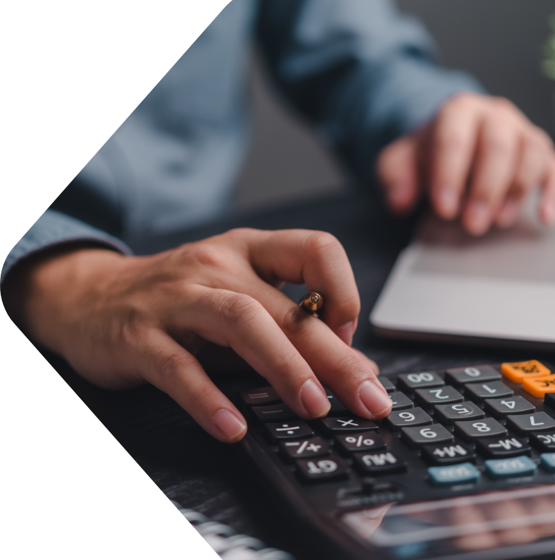 Image of a man using a calculator