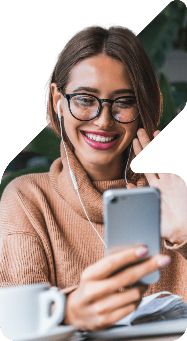 Image showing a woman booking an appointment on her phone