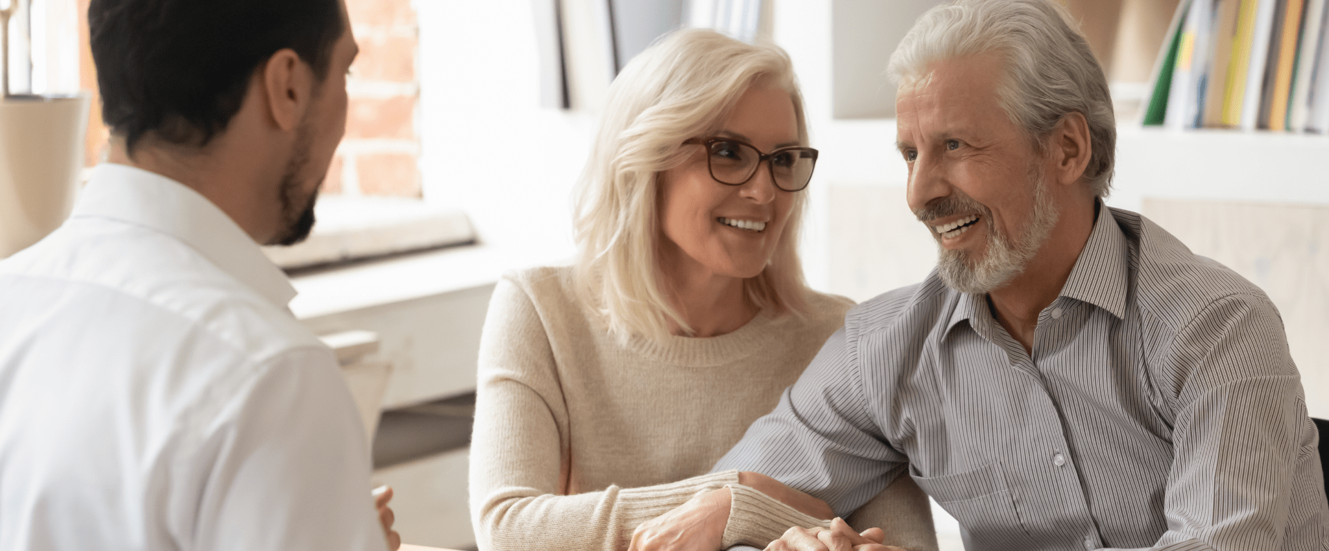 Image showing an older couple discussing with a wealth planner