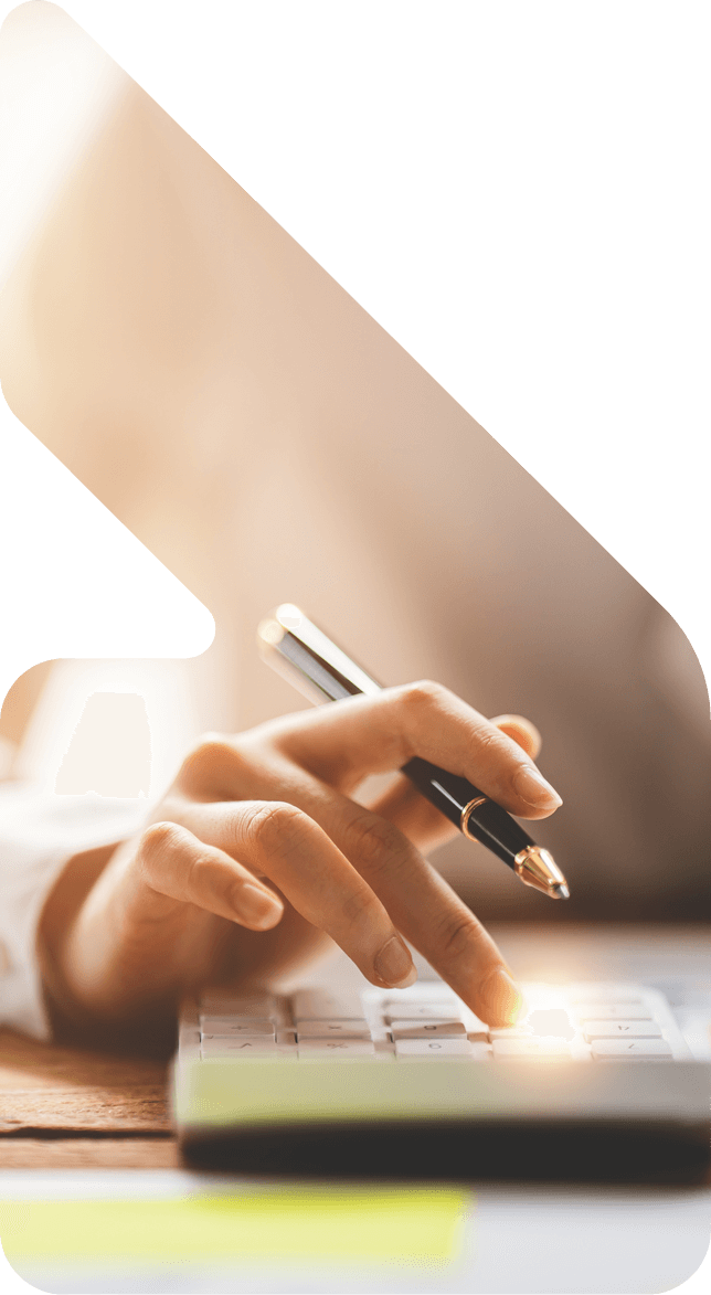 Image showing a close up of a woman using a calculator