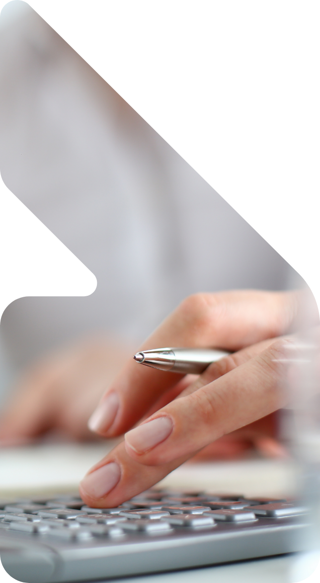 Image showing a close up of a woman using a calculator
